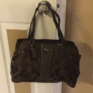 Brown “Coach” handbag